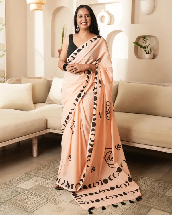 Peach_Cotton_Crescent_Om_H_Block_Print_Mul_Saree_With_Tassels_For_Women